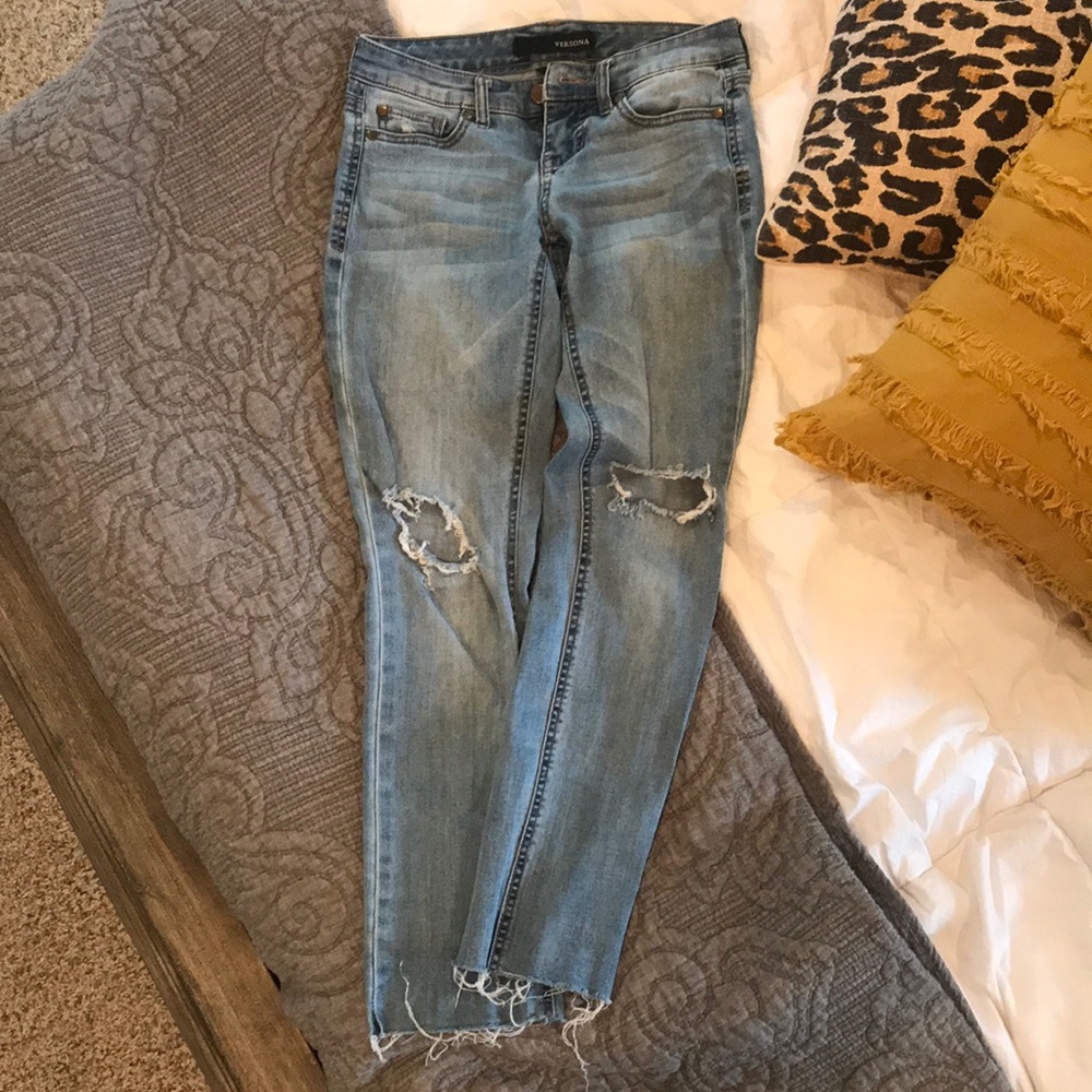 Jeans. Distressed with knee holes.